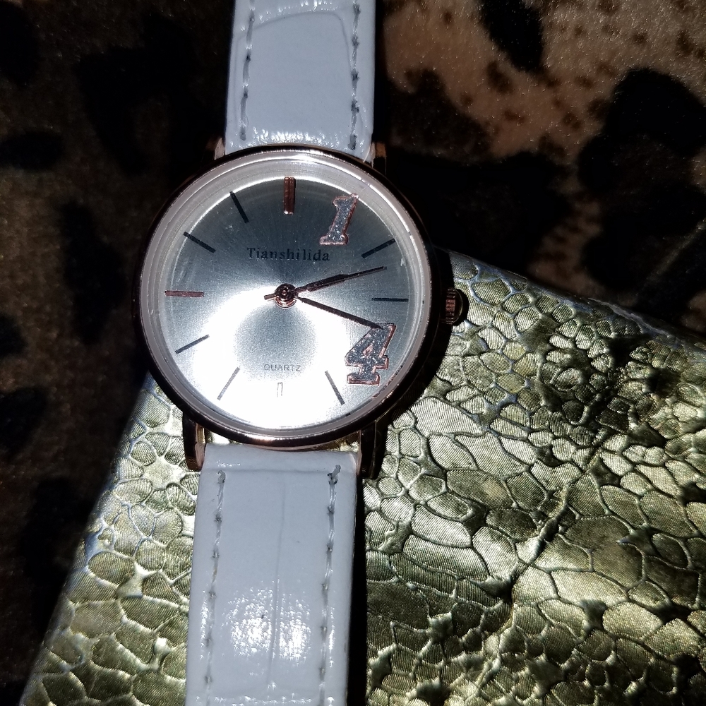 Tianshilida Women's White Banded Watch 8"